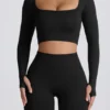 Top corto a maniche lunghe senza cuciture Super Sculpt in nero Top corto a maniche lunghe senza cuciture Super Sculpt in nero