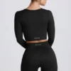 Top corto a maniche lunghe senza cuciture Super Sculpt in nero Top corto a maniche lunghe senza cuciture Super Sculpt in nero