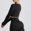 Top corto a maniche lunghe senza cuciture Super Sculpt in nero Top corto a maniche lunghe senza cuciture Super Sculpt in nero