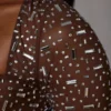 Top corto a maniche lunghe trasparente con decorazioni Guilia in color cacao intenso Top corto a maniche lunghe trasparente con decorazioni Guilia in color cacao intenso