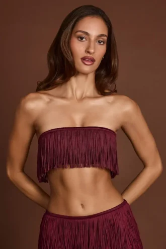 Top corto allacciato con frange Bruma in pizzo color rosso vino