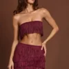 Top corto allacciato con frange Bruma in pizzo color rosso vino Top corto allacciato con frange Bruma in pizzo color rosso vino