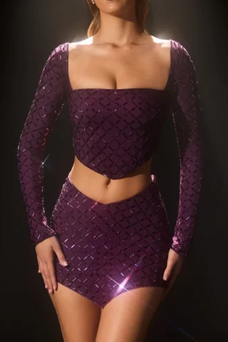 Top corto asimmetrico con decorazioni Thora in viola intenso