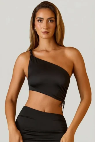 Top corto asimmetrico con ruches Brisa in nero