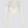 Top corto avvolgente in morbido jersey bianco Top corto avvolgente in morbido jersey bianco