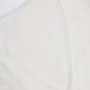 Top corto avvolgente Lou Pointelle in bianco Top corto avvolgente Lou Pointelle in bianco