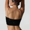 Top corto con cut-out decorato Ariana in nero Top corto con cut-out decorato Ariana in nero