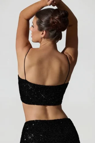 Top corto con cut-out decorato Ariana in nero