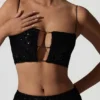 Top corto con cut-out decorato Ariana in nero Top corto con cut-out decorato Ariana in nero