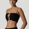 Top corto con cut-out decorato Ariana in nero Top corto con cut-out decorato Ariana in nero