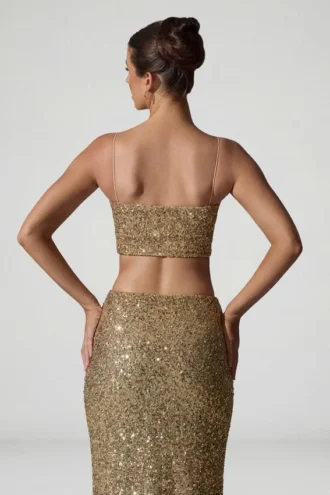 Top corto con cut-out decorato Ariana in oro