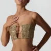 Top corto con cut-out decorato Ariana in oro Top corto con cut-out decorato Ariana in oro