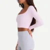 Top corto con cut-out in tessuto a costine morbido senza cuciture in rosa cipria Top corto con cut-out in tessuto a costine morbido senza cuciture in rosa cipria