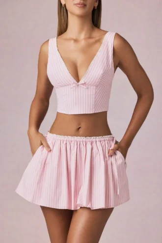 Top corto con fiocco Magda a righe color malva chiaro