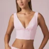 Top corto con fiocco Magda a righe color malva chiaro Top corto con fiocco Magda a righe color malva chiaro