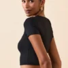 Top corto con maniche ad aletta Myaree in nero Top corto con maniche ad aletta Myaree in nero