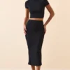 Top corto con maniche ad aletta Myaree in nero Top corto con maniche ad aletta Myaree in nero