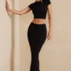 Top corto con maniche ad aletta Myaree in nero Top corto con maniche ad aletta Myaree in nero