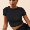 Top corto con maniche ad aletta Myaree in nero Top corto con maniche ad aletta Myaree in nero