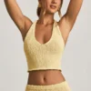 Top corto con scollo all’americana Gianna in bouclé giallo Top corto con scollo all’americana Gianna in bouclé giallo