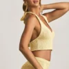 Top corto con scollo all’americana Gianna in bouclé giallo Top corto con scollo all’americana Gianna in bouclé giallo