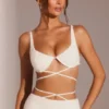 Top corto con spalline e ferretto decorato Parma in bianco Top corto con spalline e ferretto decorato Parma in bianco