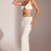 Top corto con spalline e ferretto decorato Parma in bianco Top corto con spalline e ferretto decorato Parma in bianco