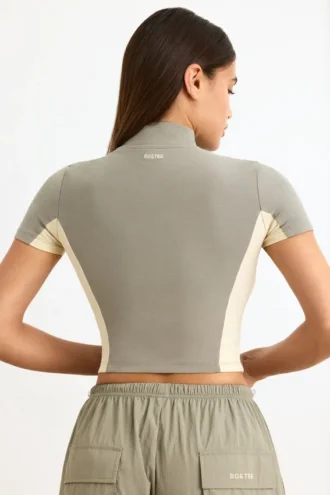Top corto con zip in jersey di cotone color block in Mineral