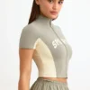 Top corto con zip in jersey di cotone color block in Mineral Top corto con zip in jersey di cotone color block in Mineral