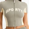 Top corto con zip in jersey di cotone color block in Mineral Top corto con zip in jersey di cotone color block in Mineral