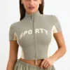 Top corto con zip in jersey di cotone color block in Mineral Top corto con zip in jersey di cotone color block in Mineral