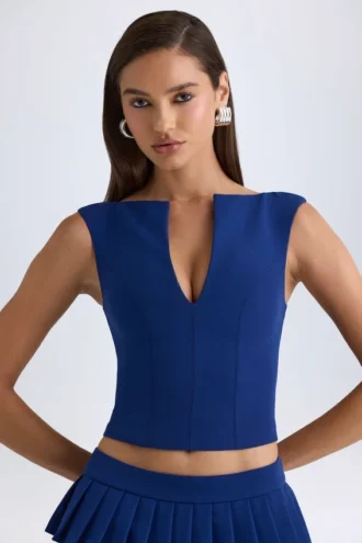 Top corto Kadie con apertura frontale in True Navy