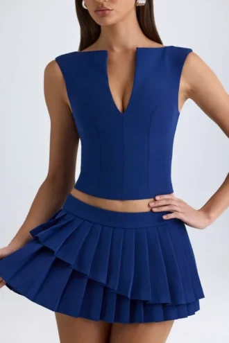 Top corto Kadie con apertura frontale in True Navy