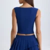 Top corto Kadie con apertura frontale in True Navy Top corto Kadie con apertura frontale in True Navy
