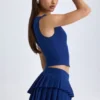 Top corto Kadie con apertura frontale in True Navy Top corto Kadie con apertura frontale in True Navy