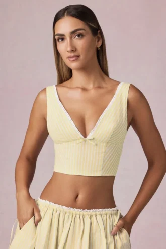 Top corto Magda con fiocco a righe giallo limone