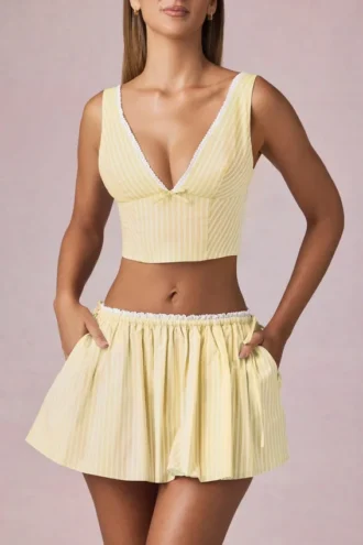 Top corto Magda con fiocco a righe giallo limone