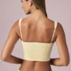 Top corto Magda con fiocco a righe giallo limone Top corto Magda con fiocco a righe giallo limone