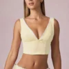 Top corto Magda con fiocco a righe giallo limone Top corto Magda con fiocco a righe giallo limone