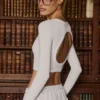 Top corto senza cuciture a costine morbide con cut-out in bianco Top corto senza cuciture a costine morbide con cut-out in bianco