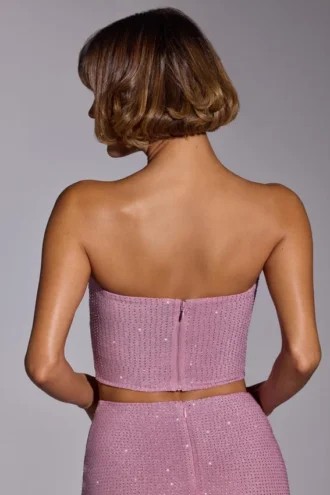 Top corto senza spalline decorato Odetta in rosa chiaro Top corto senza spalline decorato Odetta in rosa chiaro