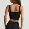 Top corto Yolanda in maglia pointelle, nero Top corto Yolanda in maglia pointelle, nero