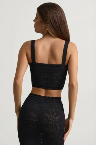 Top corto Yolanda in maglia pointelle, nero