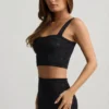 Top corto Yolanda in maglia pointelle, nero Top corto Yolanda in maglia pointelle, nero