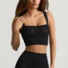 Top corto Yolanda in maglia pointelle, nero Top corto Yolanda in maglia pointelle, nero