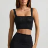Top corto Yolanda in maglia pointelle, nero Top corto Yolanda in maglia pointelle, nero