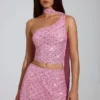 Top Cosette con dettagli asimmetrici e sciarpa decorativa in rosa Top Cosette con dettagli asimmetrici e sciarpa decorativa in rosa