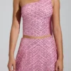 Top Cosette con dettagli asimmetrici e sciarpa decorativa in rosa Top Cosette con dettagli asimmetrici e sciarpa decorativa in rosa