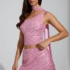 Top Cosette con dettagli asimmetrici e sciarpa decorativa in rosa Top Cosette con dettagli asimmetrici e sciarpa decorativa in rosa