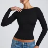 Top Elli in modal con collo alto, maniche lunghe e schiena scoperta, colore nero Top Elli in modal con collo alto, maniche lunghe e schiena scoperta, colore nero